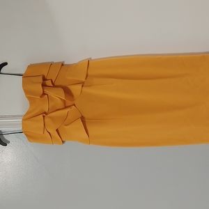 Black halo strapless bodycon dress in mustard yellow